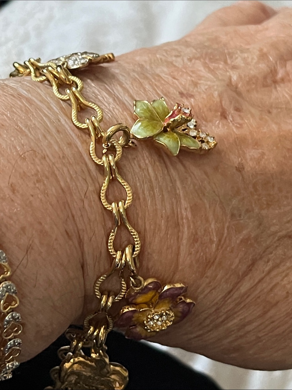 Nolan Miller charm bracelet with orchid charms - Picture 11 of 12